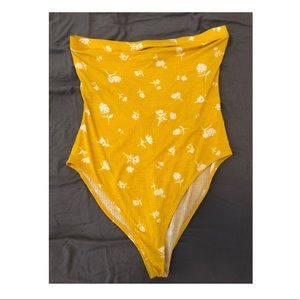 strapless yellow bodysuit